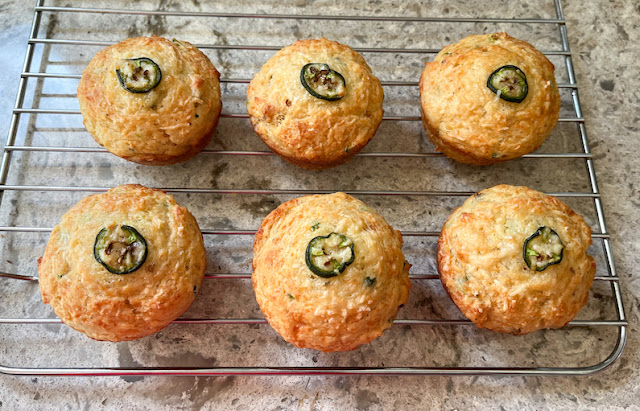 Food Lust People Love: Slightly spicy and oh so cheesy, these Jalapeño Cheddar muffins are fluffy inside with a little cheesy crunch on the outside. In short, they are delicious. Perfect for breakfast OR snack time. They are also a great accompaniment for soup!