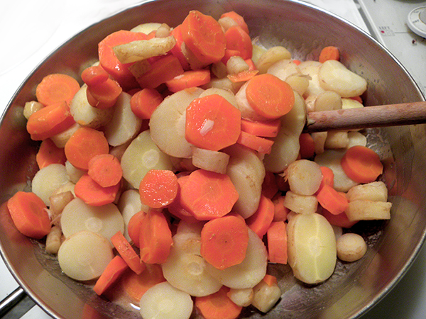 Simmered Carrots Put into Skillet with sauce