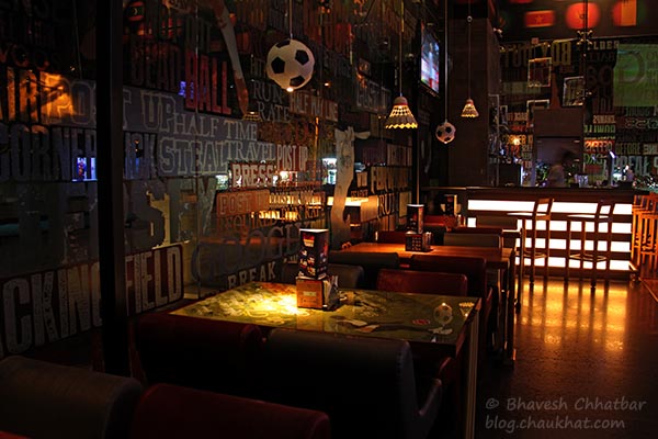 Seating arrangement at Toss Sports Lounge Koregaon Park