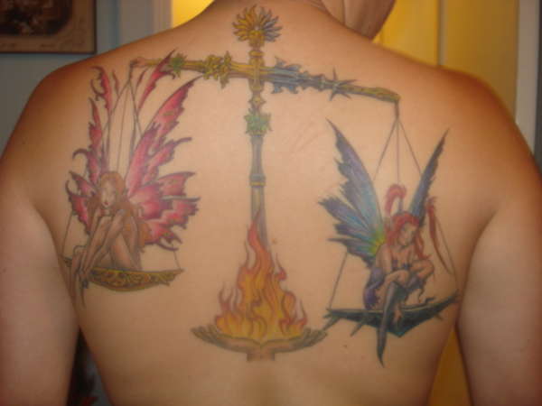 Sign Tattoo Designs is this Fairy Tattoo representing the Virgo Sign