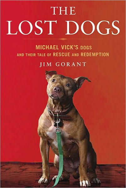book cover of The Lost Dogs, featuring a reddish very muscular pit bull