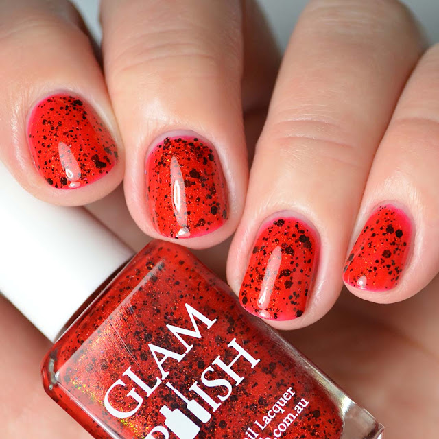 red nail polis with black glitter four finger swatch