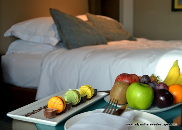 fresh fruits, french macarons and chocolates