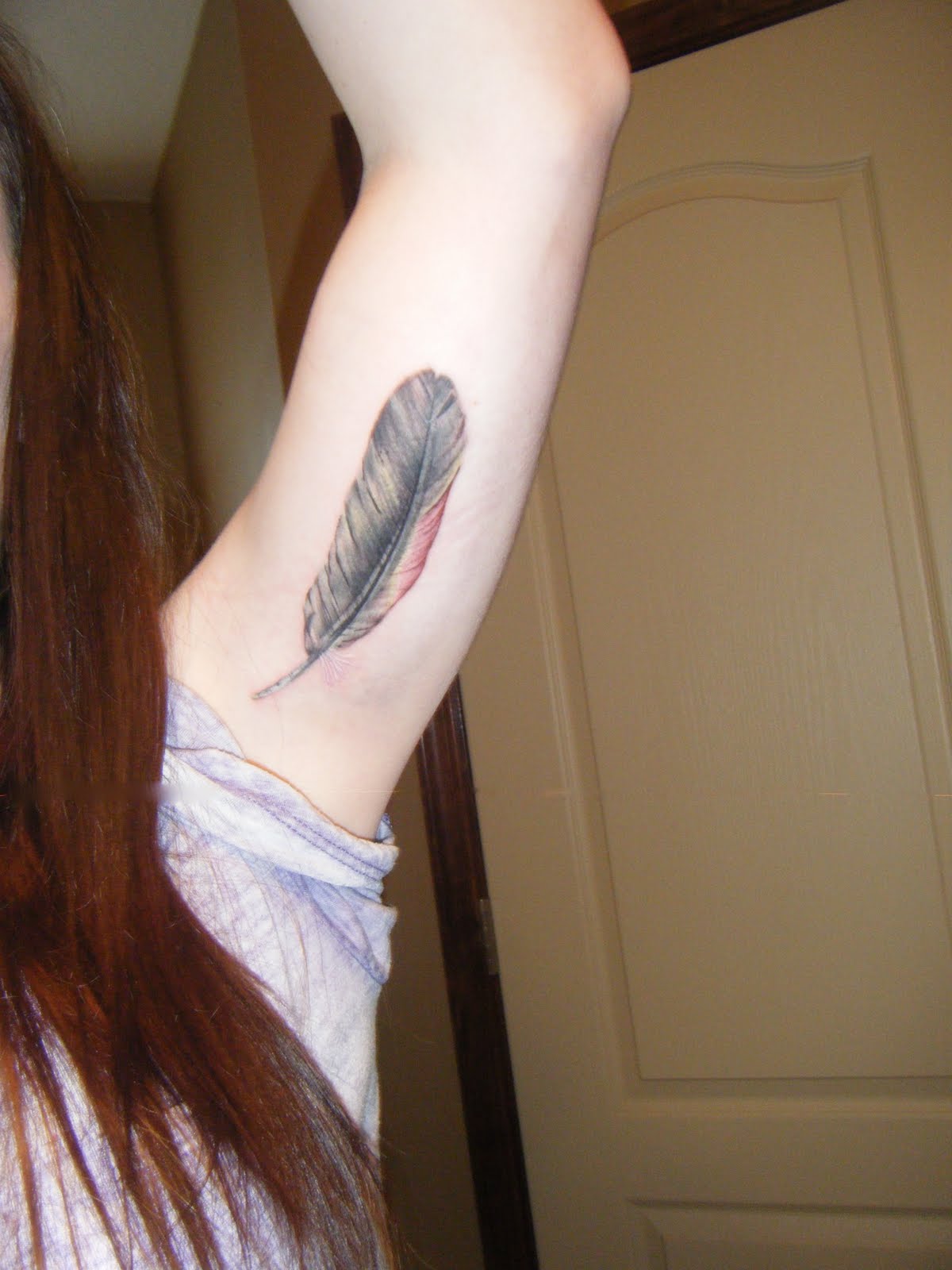 Getting my feather tattoo. I love it. :)