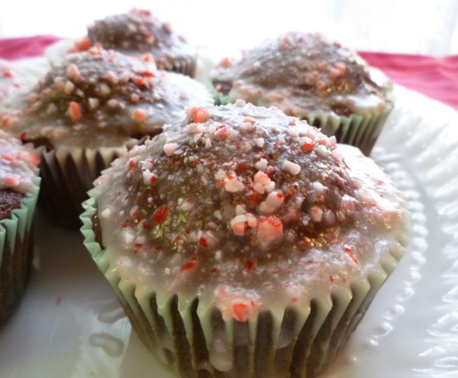 chocolate cupcakes with sprinkles Chocolate Cupcakes with Peppermint Icing and Crushed Candy Cane 