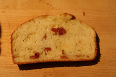 a slice of bacon asiago bread