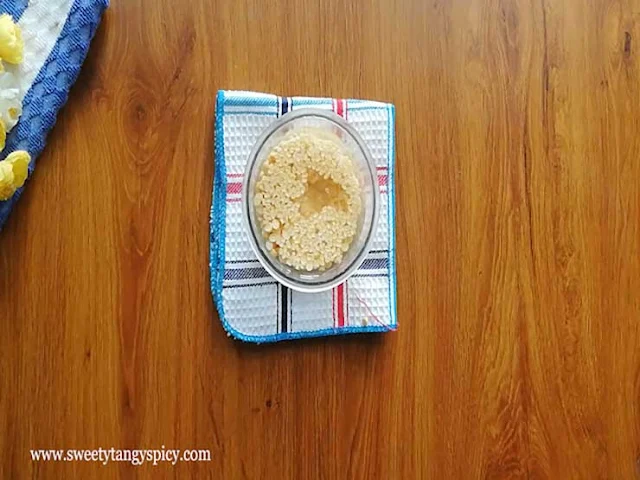 Split chickpeas and split green gram soaking in water for Pudalangai Kootu