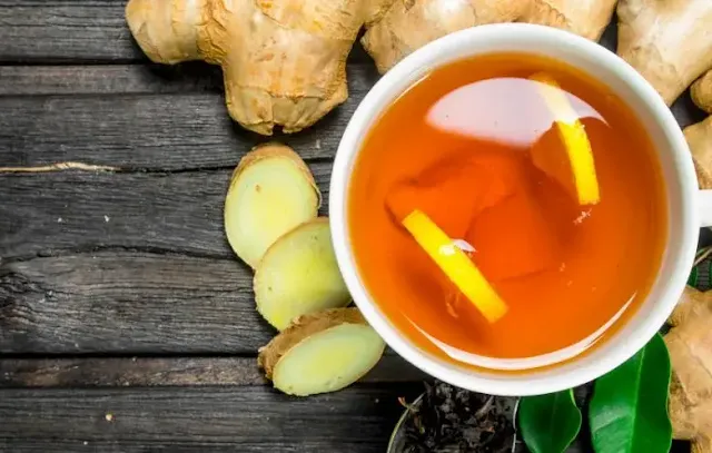 A Cup o Ginger Tea with Ginger Background