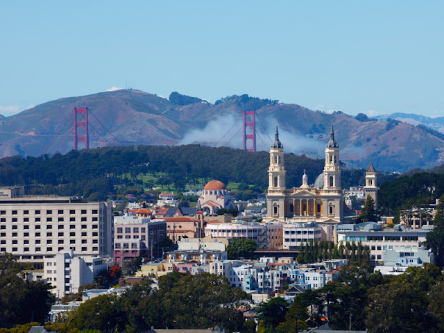 Picture of Golden Gate bridge and old San Francisco architecture 