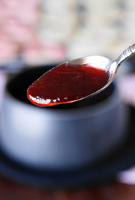 Spoonful of Thickened Raspberry Jam Image