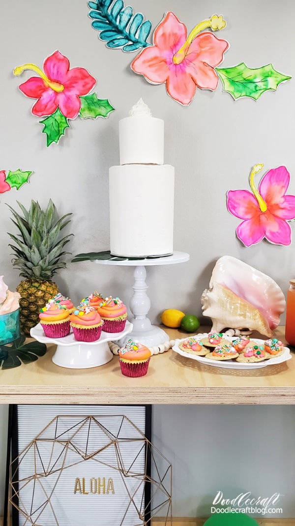 How to Throw a Luau Tropical Party!  I love a great tropical vibe--and a luau party is the perfect way to celebrate!   Let me show you some simple ways to set up a tropical luau party!   Watercolor some hibiscus flowers, make tropical cupcakes and cookies, decorate with pineapple, shells and balloons.