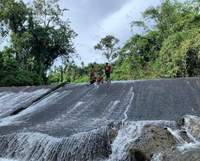 Pesona Alam Eksotis Bendungan Kampung Merdeka, Pemandian Alam Kutalimbaru