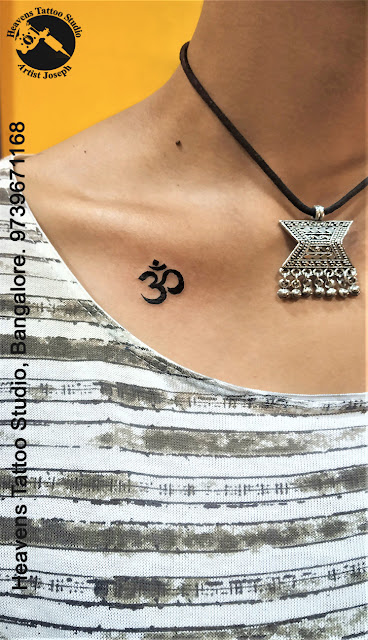 http://heavenstattoobangalore.in/small-om-tattoo-at-heavens-tattoo-studio-bangalore/