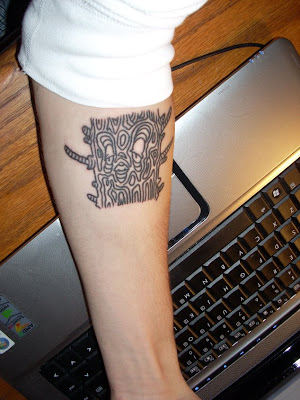 Here's a picture of my first tattoo I got on 8/8/08 at 8:00pm for $80.