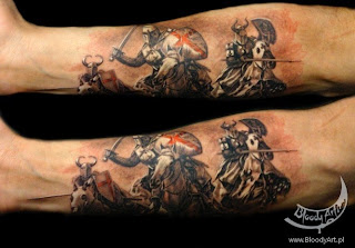 Fore-arm tattoo: mounted medieval knights