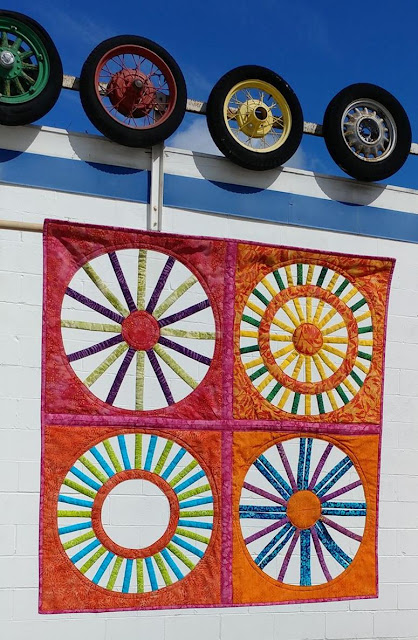 Open weaving circle quilt using Island Batik fabrics