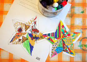 Doodle some designs on these awesome 3D paper Christmas Stars- great Kids art project