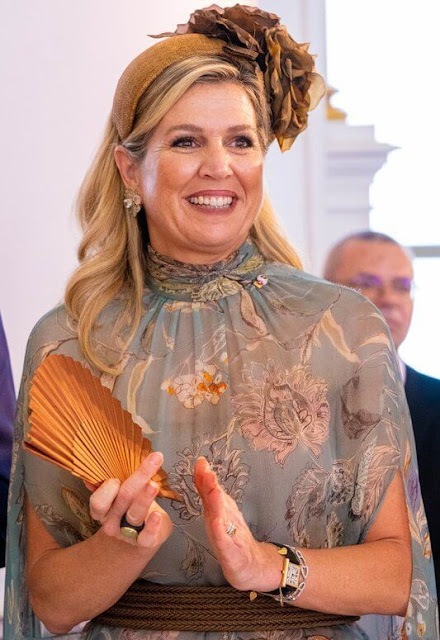 Queen Maxima wore a floral print tulle dress by Natan. President Alexander van der Bellen and Doris Schmidauer