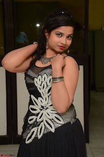 Shrisha Dasari in Sleeveless Short Black Dress At Follow Follow U Audio Launch 038.JPG