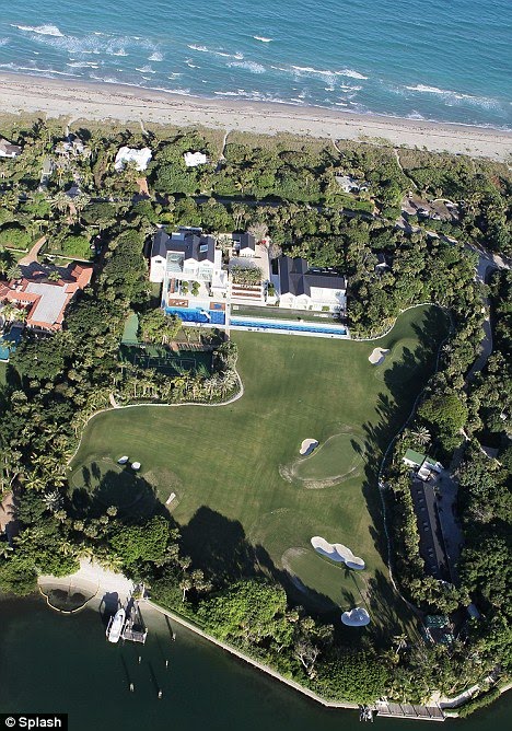 tiger woods ex wife new house. Surrounded by water: The house