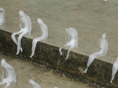 Ice Sculptures of Melting Men