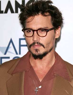 Johnny Depp seen sporting some facial hair and a Hawaii 5 0 hairstyle in 