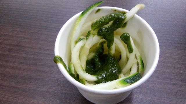 Pasta and pesto sauce. That noodles is actually zucchini, then sauce is made by blending basil, cashew, olive oil, garlic, salt and pepper. Wow! Never thought it would be so easy- it's all made from scratch so nothing artificial!