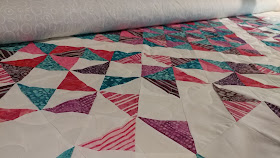 Freemotion meandering quilting on a longarm