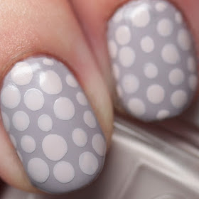 Essie Between the Seats over Without a Stitch dot manicure