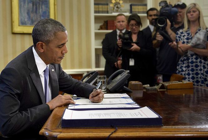 Mundo/Obama firma la ley que autoriza a  Puerto Rico a reestructurar su deuda