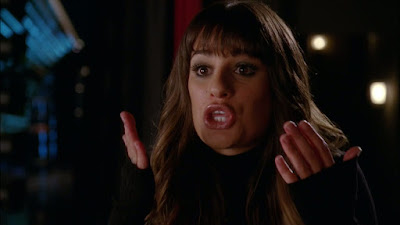 Close up of Rachel yelling at Finn who is out of frame