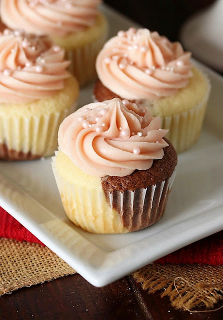 Neapolitan Cupcakes with Strawberry Frosting Image