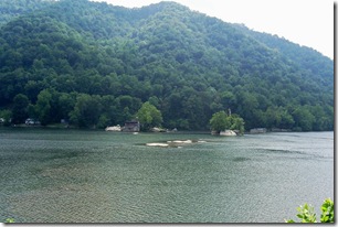 Gauley Bridge old bridge abutments and piers in river.