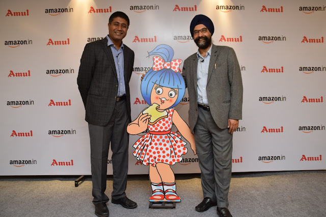 Gopal Pillai, Director & GM - Seller Services, Amazon India with R.S. Sodhi, Managing Director, GCMMF (Amul) announcing their exclusive p