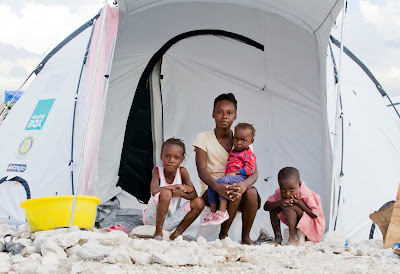 A family receives a ShelterBox tent - ShelterBox USA