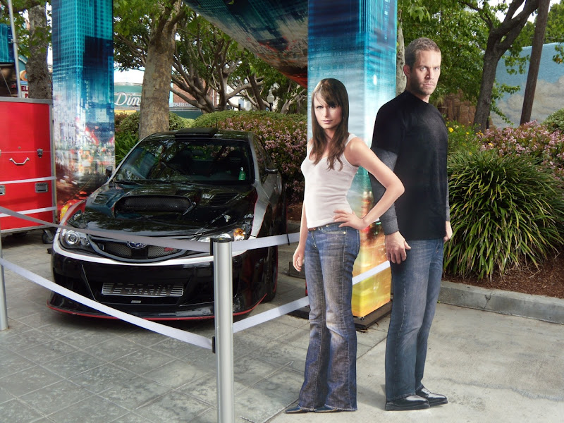 Fast & Furious stars Jordanna Brewster and Paul Walker and car