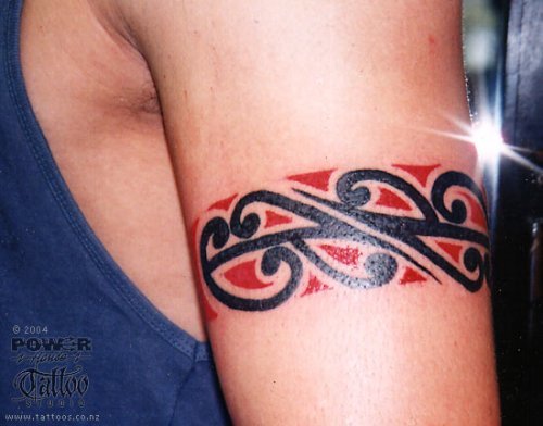 you'll see that the tribal arm tattoo is popping up everywhere.