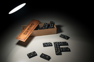 Some dominoes on a table.