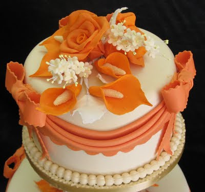 Orange Wedding Cakes With Tropical Flowers