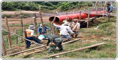 Kepedulian Kodim 0311/Pessel Memperbaiki Irigasi Petani