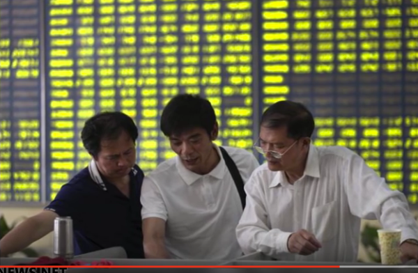 Image Attribute: China- stock market traders hoping to make a win. (Screenshot/YouTube)