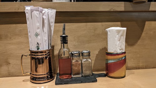 Napkins, chopsticks, and seasonings