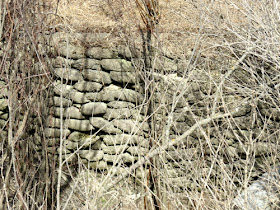 retaining wall of concrete bags