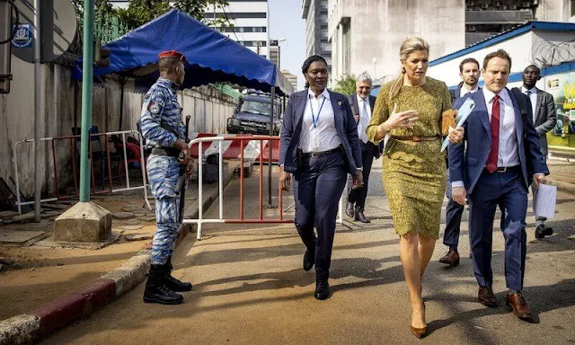 Queen Maxima wore a green lace outfit, topa nd skirt, by Natan. The Queen met with First Lady Dominique Ouattara