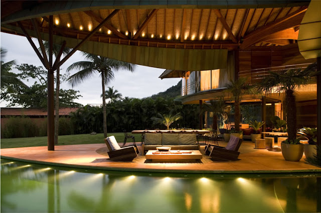 Picture of open living room by the pool