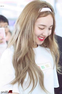 Photos of Twice Nayeon with blonde hairstyle