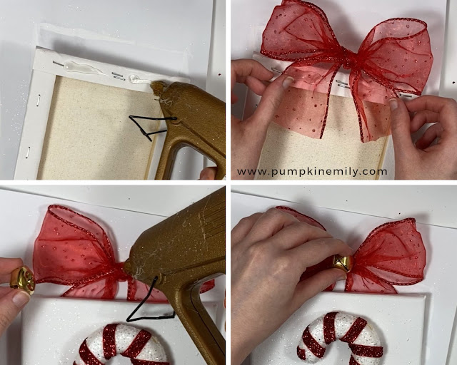 Gluing a bow with a bell on the back of the canvas.