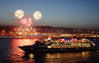 A Mickey-head fireworks display greets the Disney Magic as it pulls into the port of Barcelona