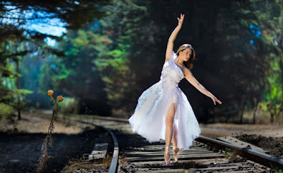 dancing-girl-on-railway-crossing-imgaes