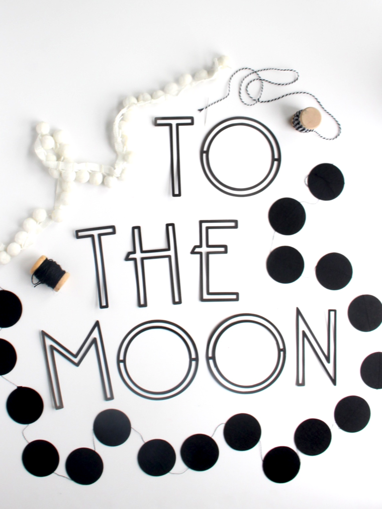 This modern "to the moon" banner is perfect for any child's room! 